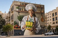Chef Farah mural on a building